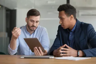 Sports agent in meeting with footballer