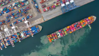 Cargo ship pulling into port