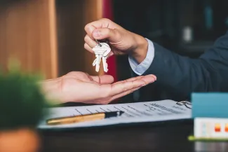 House keys changing hands