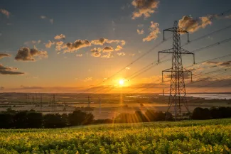 Electricity pylons at sunset