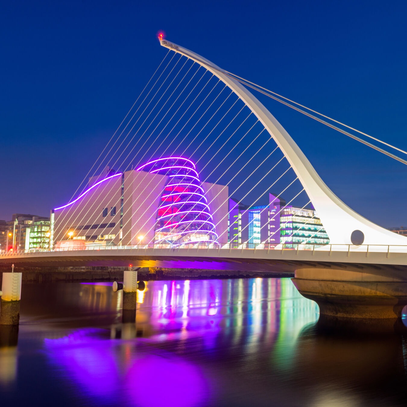 Dublin, Ireland - Wide angle view of the Samuel Beckett Bridge over the River Liffey at dusk. Designed by Santiago Calatrava and opened in 2009.
