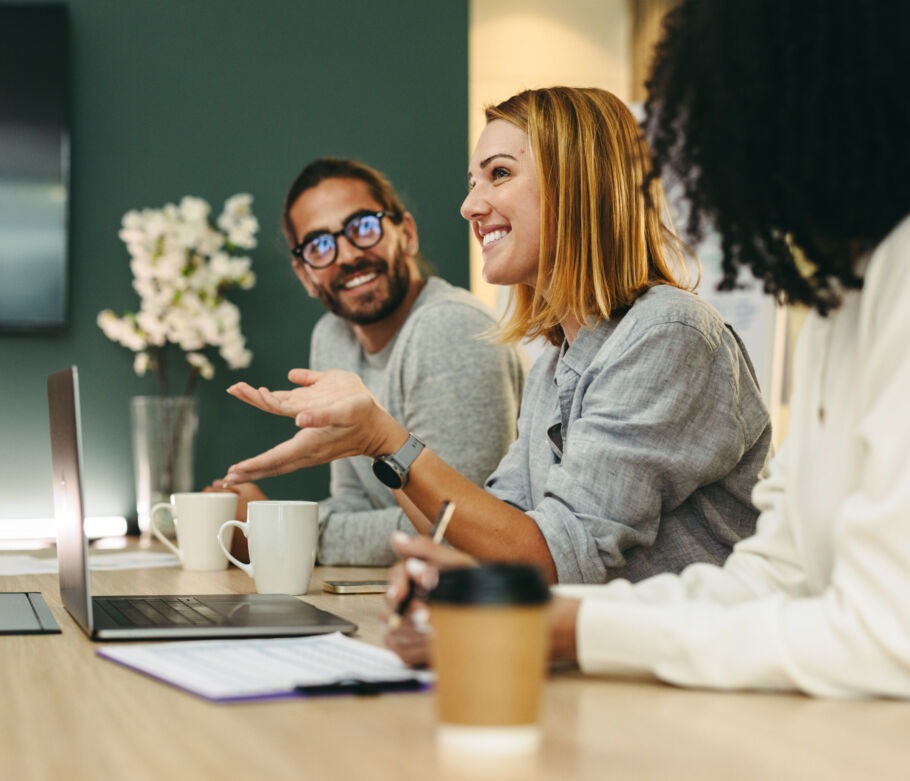 Woman speaking in team meeting