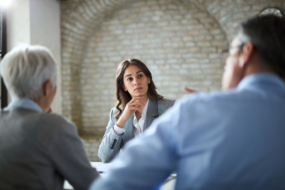 Woman listening to man and woman arbitration
