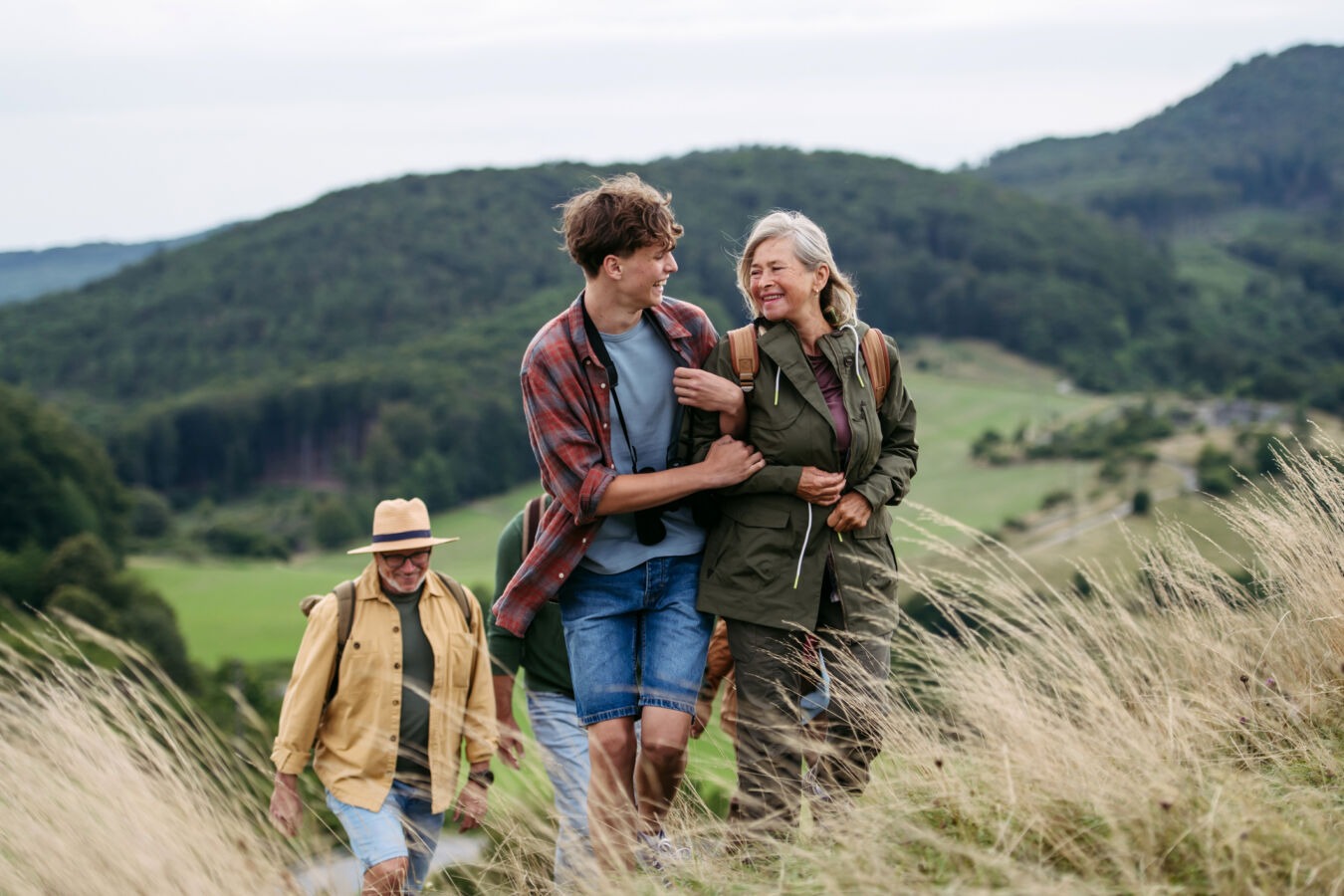 Family walking through hills
