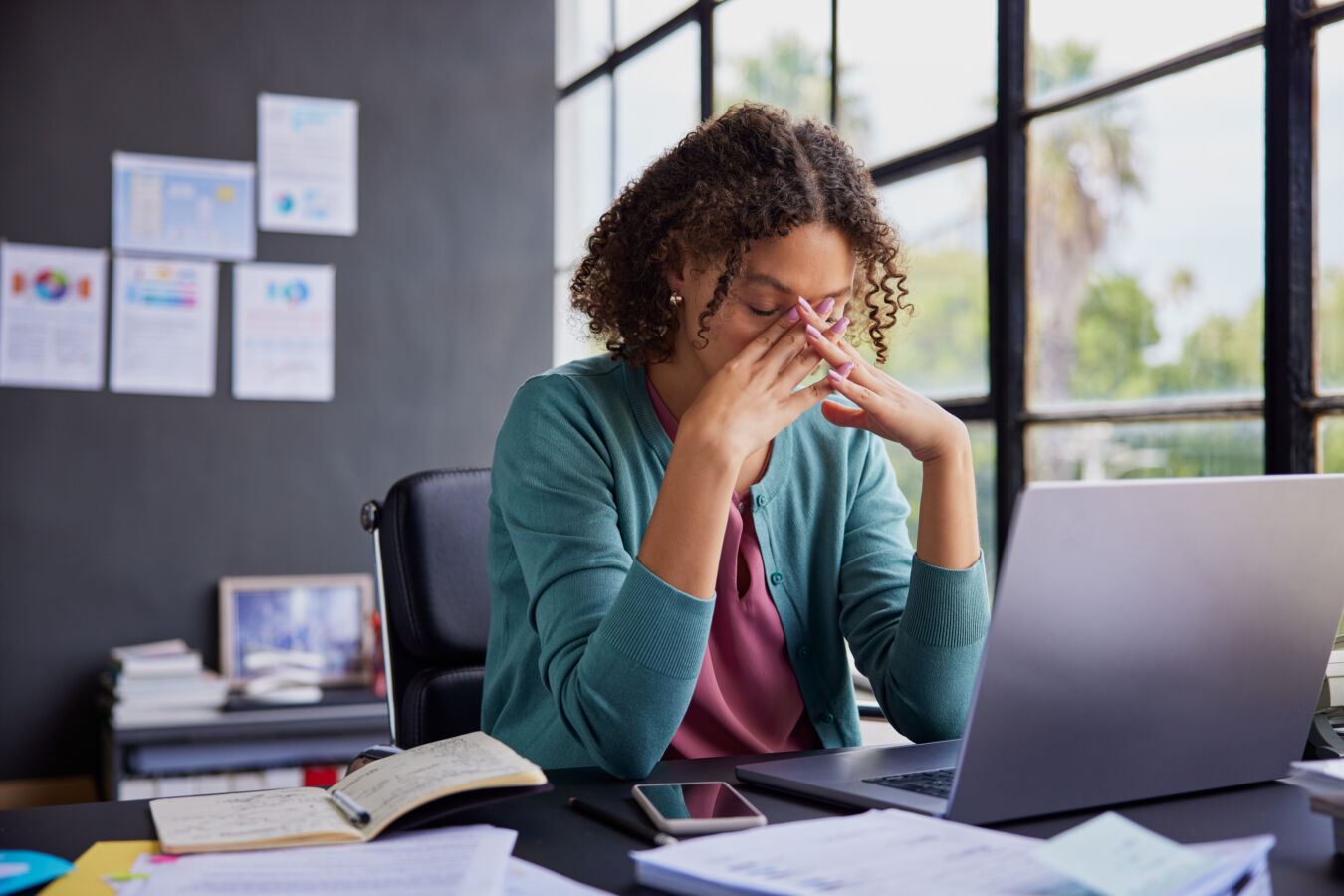 Stressed woman in the workplace