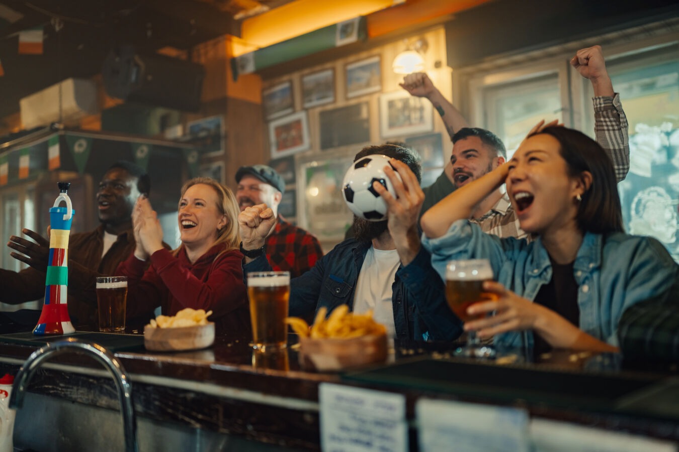 Fans watching football in bar