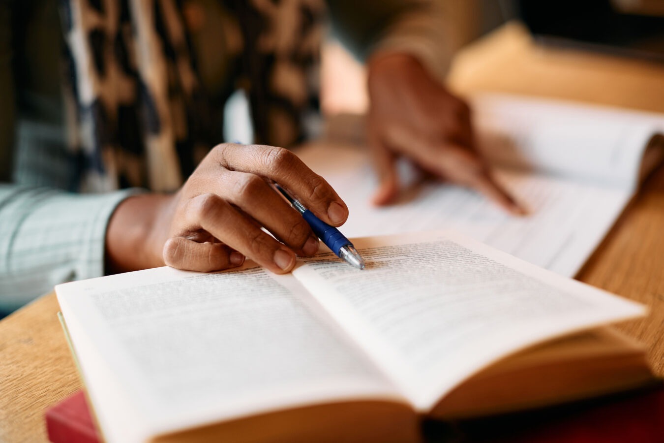 Person studying books