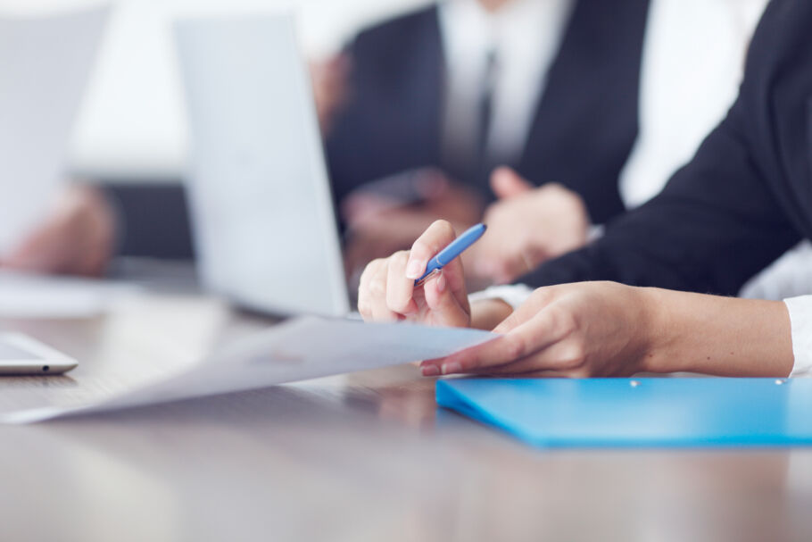 Employee with contract documents