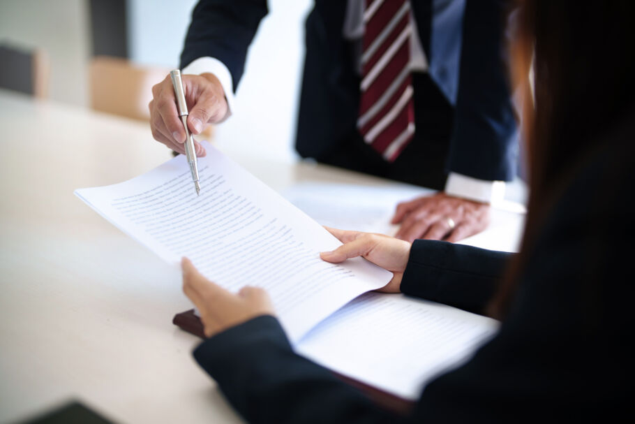 two people discussing a contract